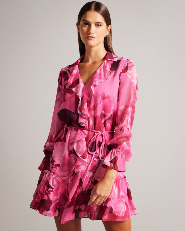 JJOJJO-Dresses-JJOJJO is a floral fantasy. A flattering A-line silhouette combined with the whimsical paper flowers print brings an irresistible charm to this dress. Long sleeves with fluted cuffs and a ruffled front add a touch of playful elegance, while the V-neck elongates the neckline. Mini dress A-line silhouette Paper flowers print Long sleeves with fluted cuff Ruffled front V-neck Waist tie Metal ball trim- Ted Baker Romania